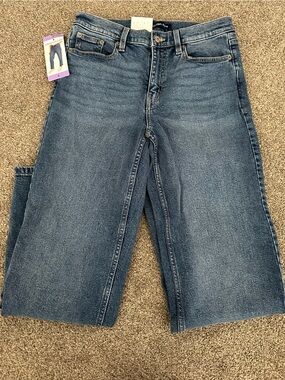Calvin Klein Women's High Rise Straight Leg Jean in color: Melody